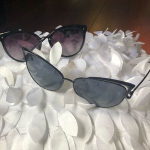 2 pairs of black frame Cat eye sunglasses.